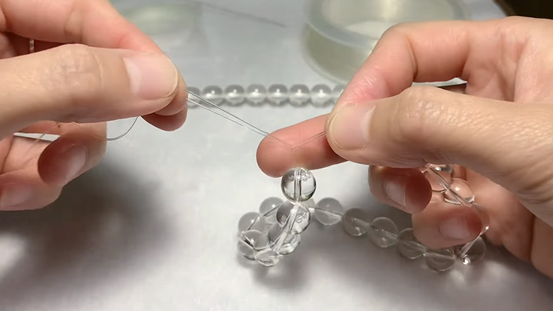 how to tie clear bead n stretch