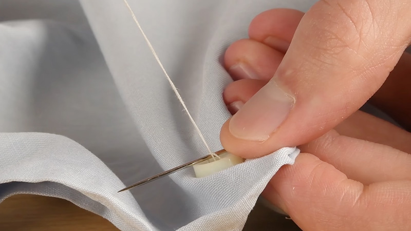 How to Sew a Button on a Shirt