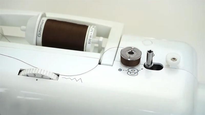 What Are the Key Considerations for Maintaining the Elna 1400 Sewing Machine When Using Metal Bobbins