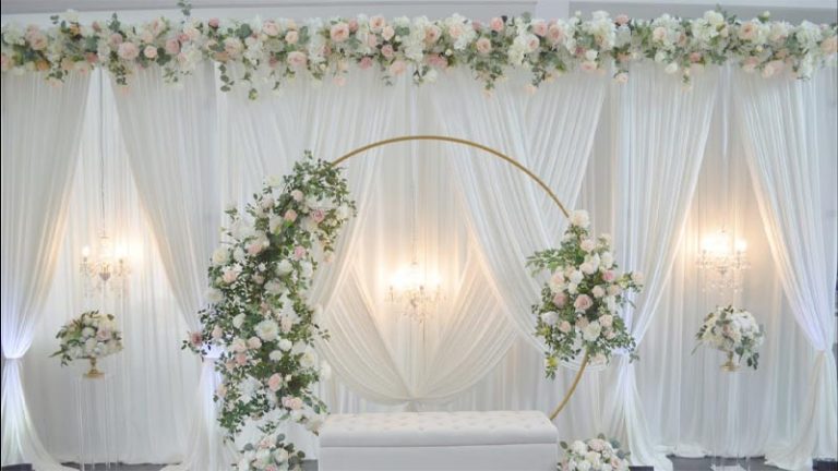 How to Decorate a Wedding Arch with Fabric